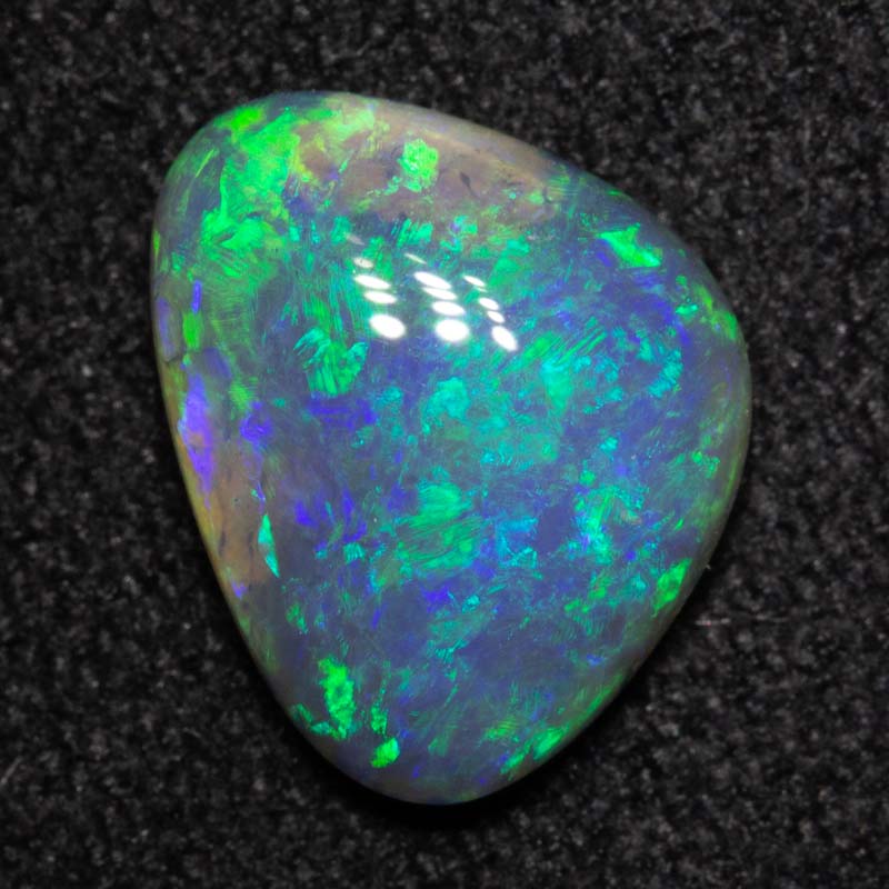1.41 ct dark opal 9.9x7.8x3.2mm