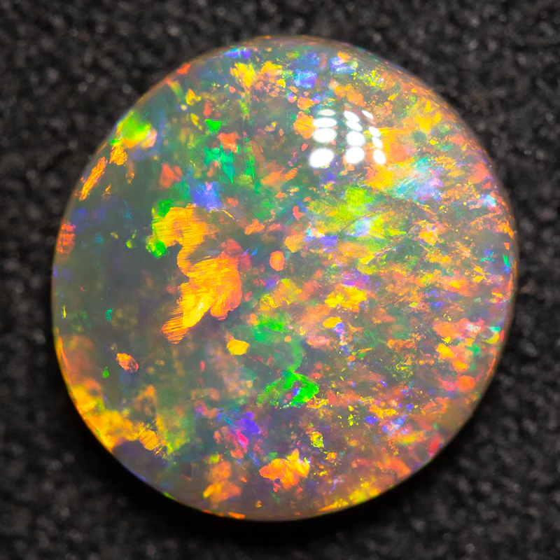 1.50 ct crystal opal 8.8x8.3x3.4mm