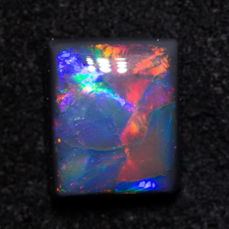 1.53 ct cushion cut black opal 8x7x3mm