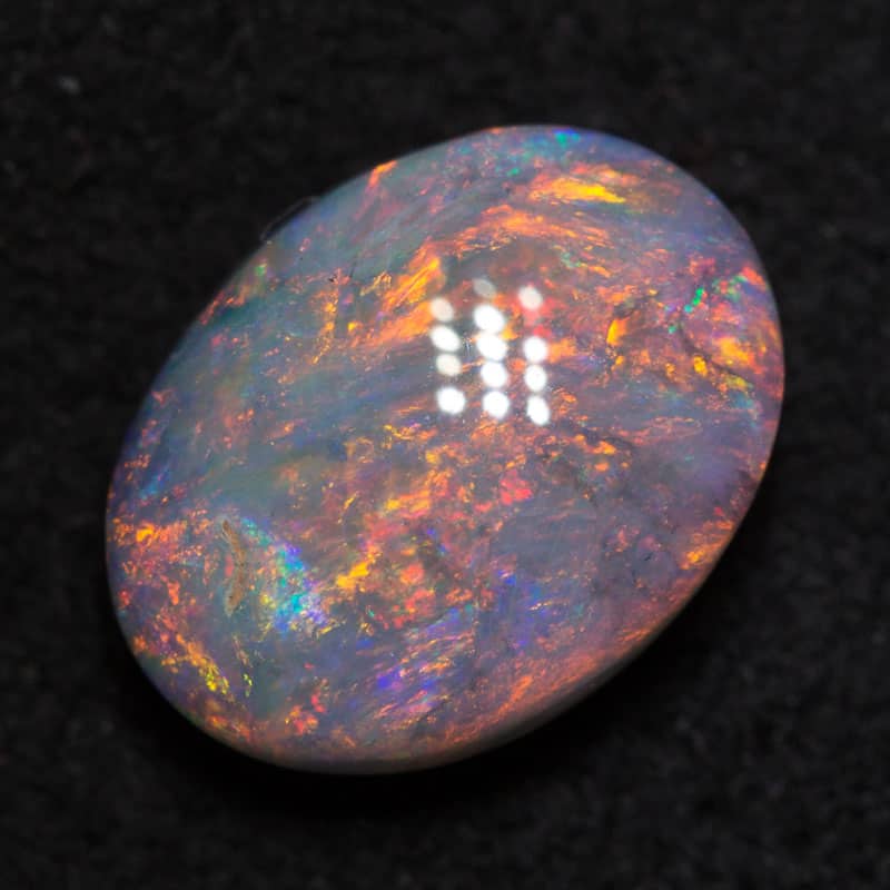 1.65 ct dark opal 9.5x7x4mm