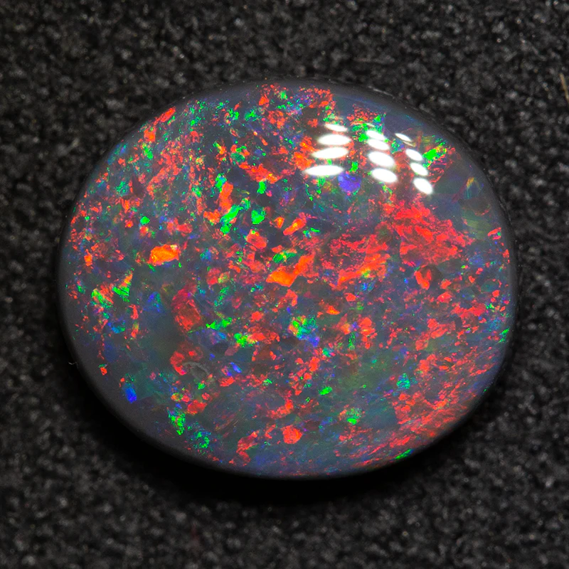 1.72 ct black opal 9.5x8.3x3mm
