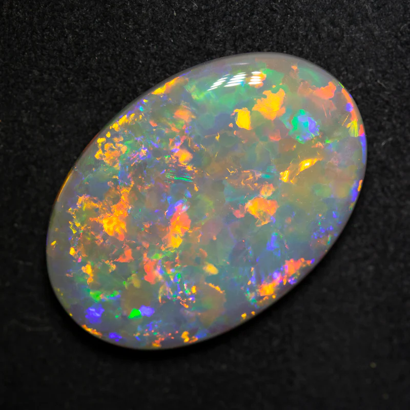 10.14 ct dark opal 22.4x15.6x4.4mm