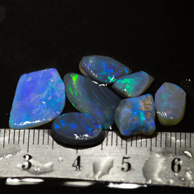 11.68 ct opal rubs parcel 7pc