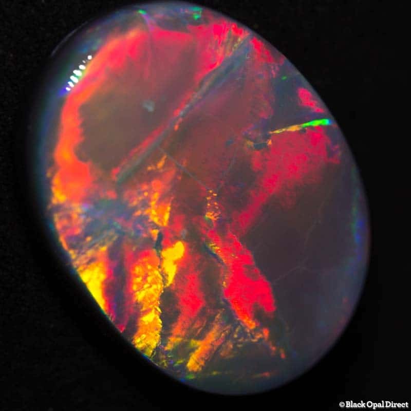 13.71 ct semi black opal 22x16x5mm