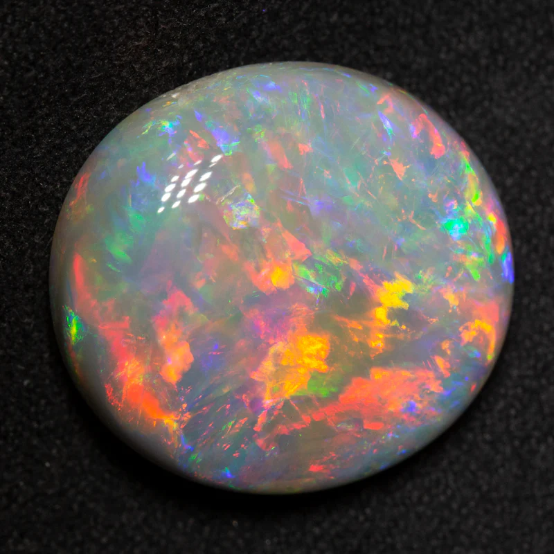 15.69 ct dark opal 18.7x17.4x7.8mm