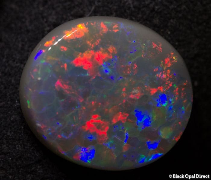 2.44 ct semi black opal 11.5x10x3mm