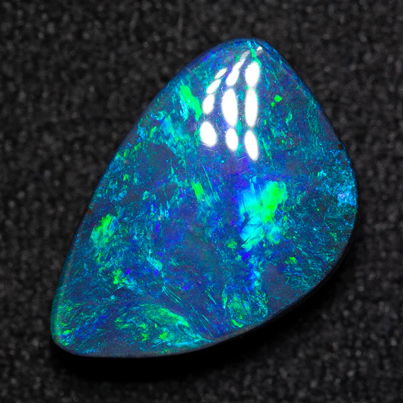 2.47 ct boulder opal 11x7.5x3.5mm