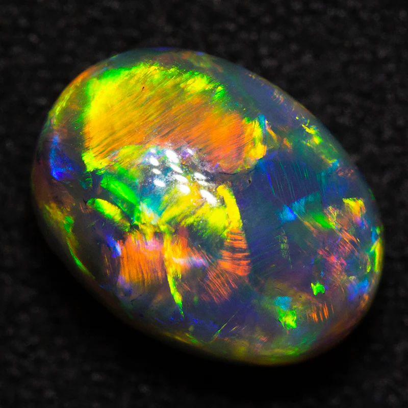 2.55 ct gem dark crystal opal 9.4x7.1x6.6mm