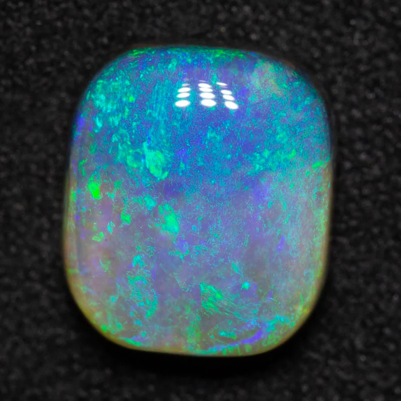 2.64 ct dark opal 9.7x8.4x4.1mm