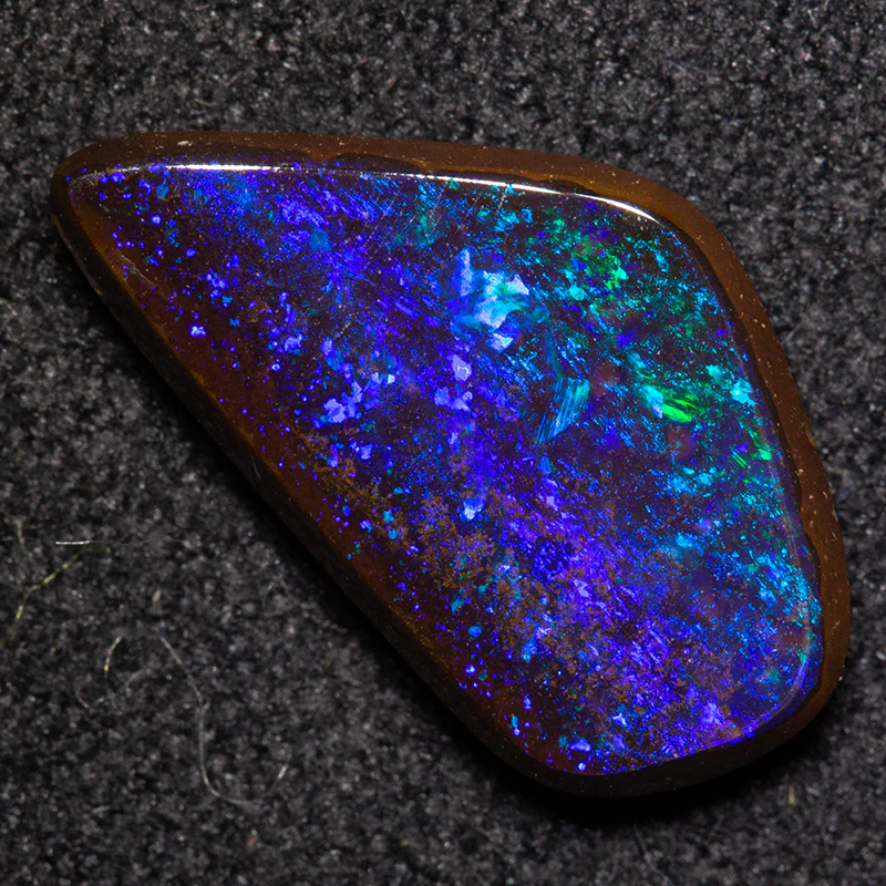 2.77 ct boulder opal 14.2x7.9x2.6mm