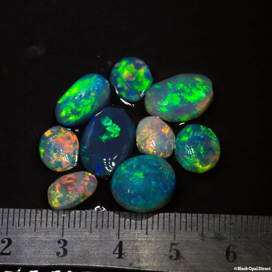 24.72 ct opal rubbed parcel 9 pieces