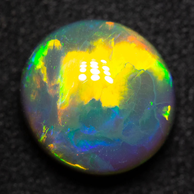 3.25 ct gem black opal 9.5x9x5mm