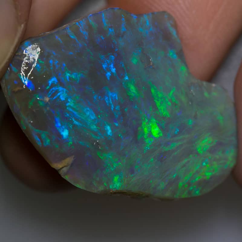 32 ct roughly rubbed opal piece 36mm across