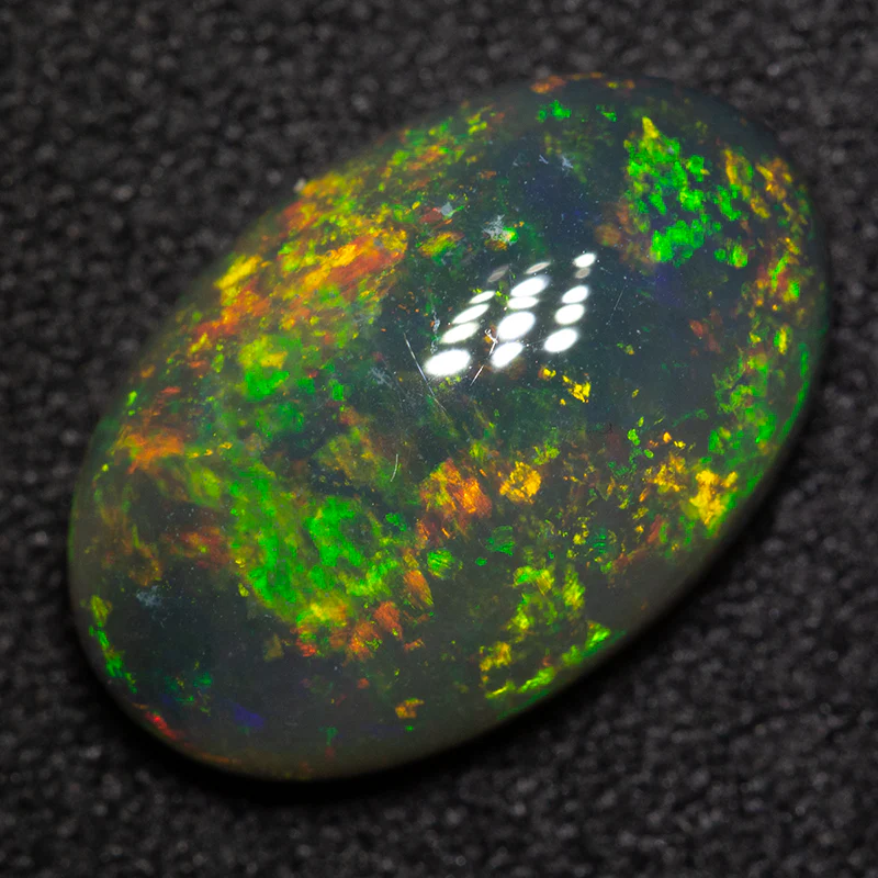 4.10 ct black crystal opal 14x9x4.5mm