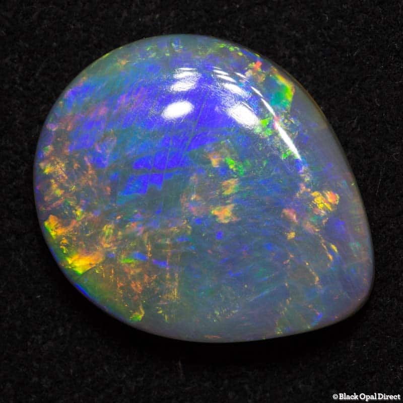 6.33 ct semi black double sided opal 16x13x5.5mm