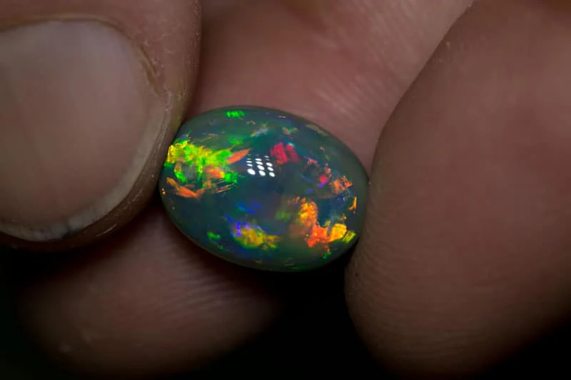 6.86 ct gem black opal 13.5x10x8mm