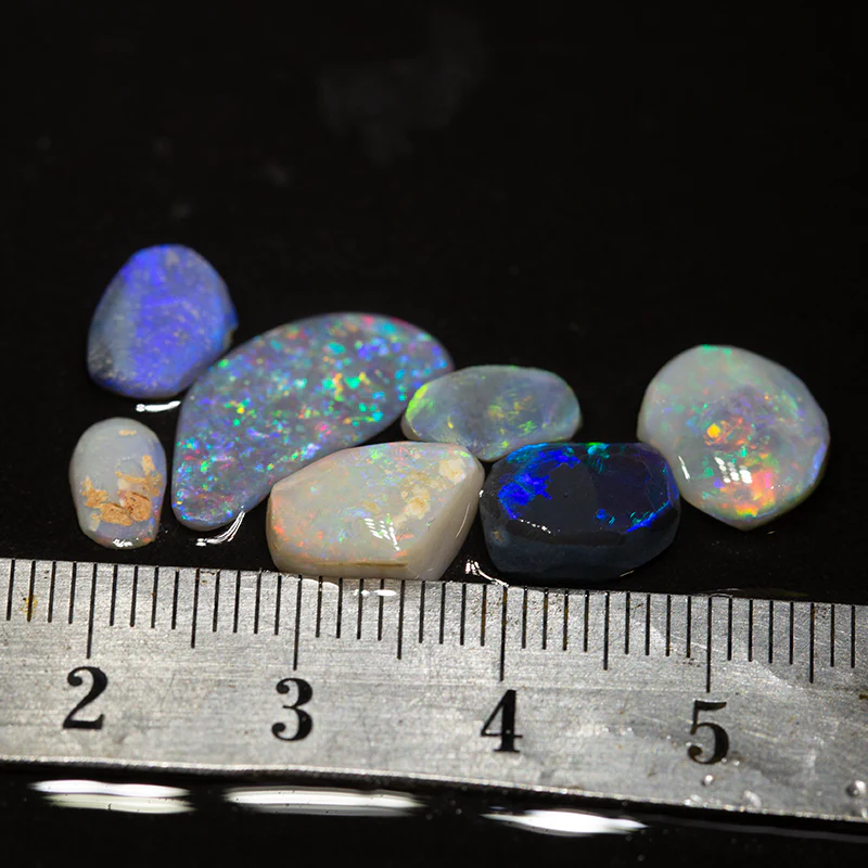 9.65 ct opal rubs parcel 7pc